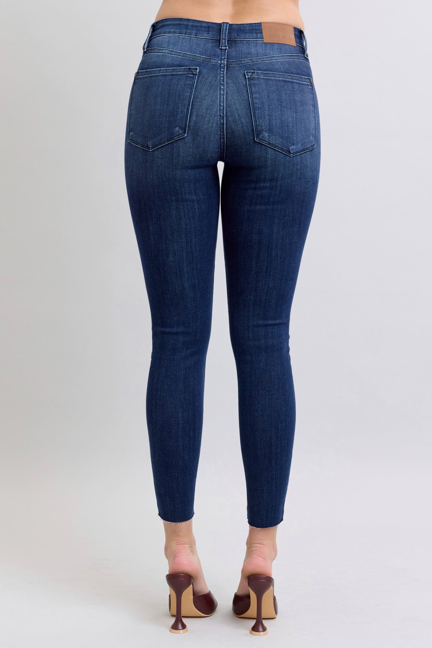 Judy Blue Mid-Rise Raw Hem Skinnies