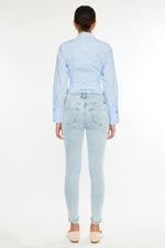 Load image into Gallery viewer, KanCan High Rise Light Wash Distressed Skinnies
