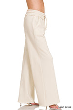 Load image into Gallery viewer, Fleece Exposed Seam Extra Wide Leg Sweatpants Sand Beige
